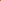 Close-up of a folded piece of vibrant, lightweight Plain Rayon - Mustard fabric by Super Cheap Fabrics, 140cm wide, showcasing its smooth texture and fine weave details. The careful arrangement highlights the richness of its color and sheen.