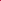 A close-up of the rich Barkeycorn Red twill from Super Cheap Fabrics showcases its smooth texture. This medium-weight suiting fabric, 145cm wide, is neatly folded, highlighting sharp lines and shadows that enhance its vibrant diagonal weave.