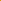 A close-up of a folded piece of Milano Ponte - Symphonic Sunset fabric from Super Cheap Fabrics, highlighting its bright yellow, heavy-weight material with a smooth texture and even surface. The gentle reflection of light off the fabric accentuates its rich, vibrant color—a true symphonic sunset.