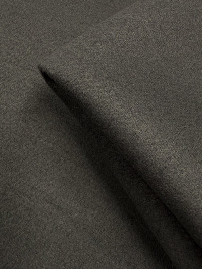 A close-up of Super Cheap Fabrics’ Wool Cashmere in Agave Green (150cm), highlighting its soft texture and smooth, even weave.