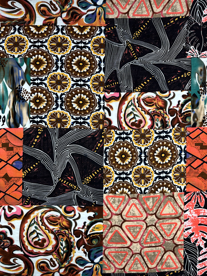 Super Cheap Fabrics' Linen Blend - Patch - 145cm is vibrant, showcasing a collage of patterns and colors with floral motifs, geometric shapes, and swirling abstracts in earthy tones of brown, black, orange, with hints of green and red on lightweight linen fabric.